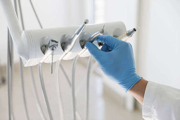 Professional Root Canal Treatment technician working in Pasquotank County County, NC
